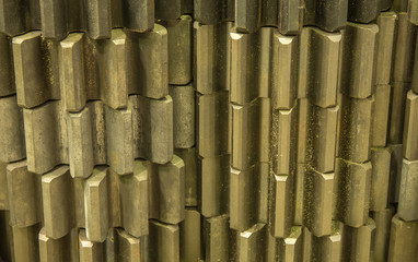 Tooth surface of brass gears background texture.