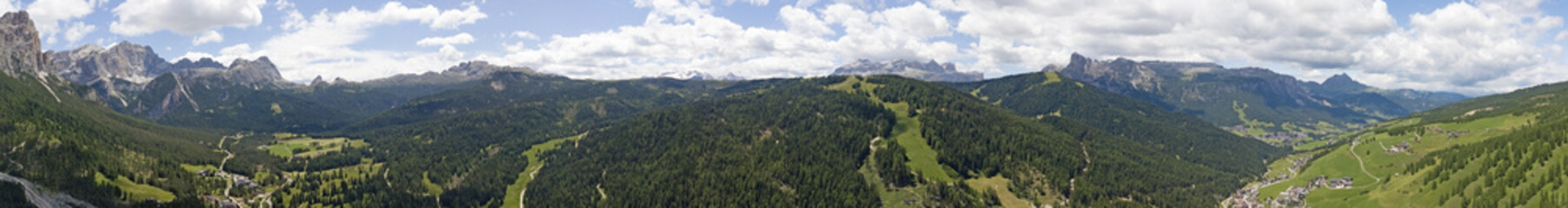 Fantastic landscape on the Dolomites. Drone aerial view on the peaks called Pizes de Fanis, Lagazuoi, Sas de Stria, Marmolada and Sella