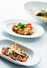  beef with vegetable garnish