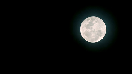 Fototapeta premium Full Moon or Supermoon / The Full Moon is the moment the entire face of the Moon is illuminated by the Sun's rays. It is the 3rd primary phase
