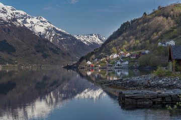 Fototapeta na wymiar Waterside view of Sørfjord, Branch of Hardengerfjord, Hordaland, Norway