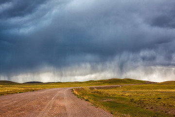 Rain above the road in Kazakhstan steppe