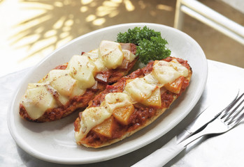 Sandwich with bolognese, cheese and pineapple