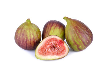 whole and half cut ripe fig on white background