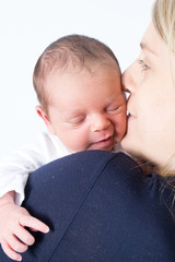 Mother with baby isolated on white