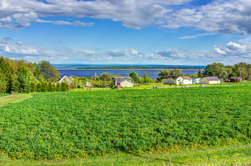 Fototapeta na wymiar Cityscape landscape view of farmland in Ile D'Orleans, Quebec, Canada