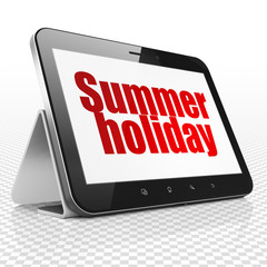 Vacation concept: Tablet Computer with Summer Holiday on display
