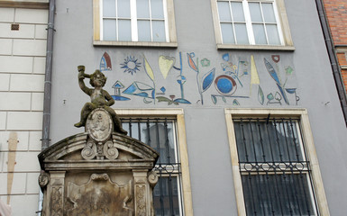 Details of the street with angel, Gdansk, Poland