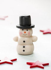 Schneemann confiserie mit roten Sternen