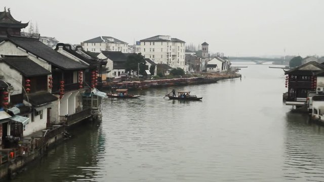 Zhujiajiao traditional wooden boat across the river. Shanghai, China.