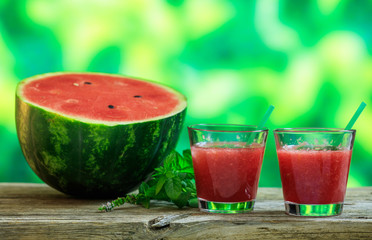 Watermelon juices on a wooden table