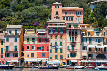 Portofino typical beautiful village with colorful houses facades in Italy, Liguria sea coast
