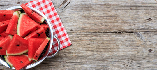 Watermelon pieces on a wooden board