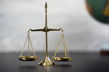 Symbols for balance and power in law and court, selected focus, narrow depth of field