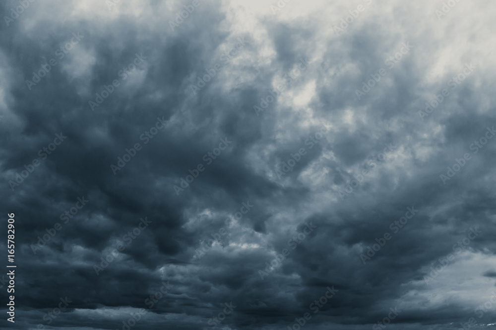 Wall mural rain strom cloudy darkness frightening sky in rainy season black dark color tone.