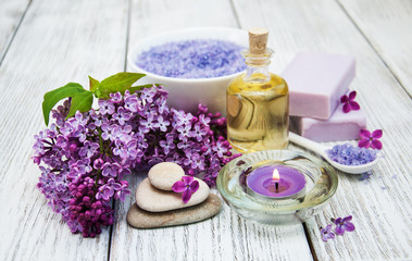 Spa setting with lilac flowers