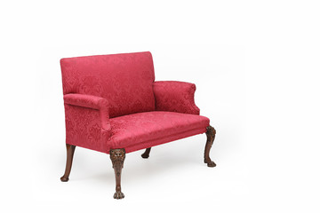 Large antique chair with red uphostery