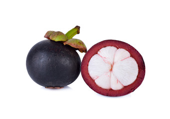 whole and half cut ripe mangosteen on white background