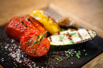 Grilled vegetables on a stone board