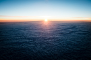 Fototapeta premium Sunrise from Airplane 