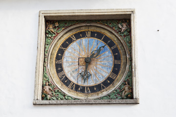 Fototapeta na wymiar medieval clock of the Holy Spirit Church, Tallinn, Estonia