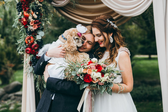 Beautiful wedding couple on the wedding autumn ceremony