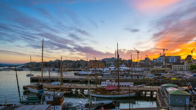 Day to Night Time Lapse video of Oslo city, Oslo port with boats and yachts at twilight in Norway, Timelapse 4k