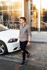 Man walk on the street with car background