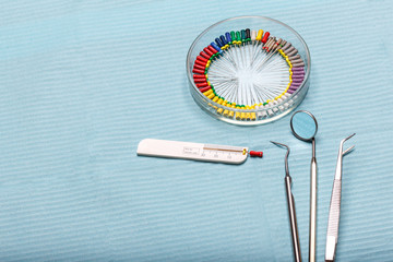 endodontic instruments on the napkin. Top view.