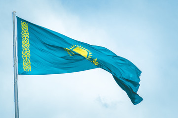 Blue flag of Kazakhstan waving on flagstaff