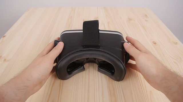Put on virtual reality glasses from the first person