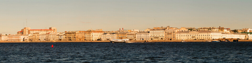 Fototapeta premium Panoramic view of the Neva River embankment in St. Petersburg.
