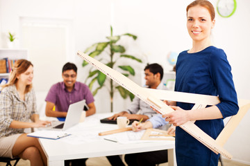 Young engineer smiling at camera