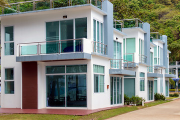 Row of modern beautiful villas on the asian resort in holiday village