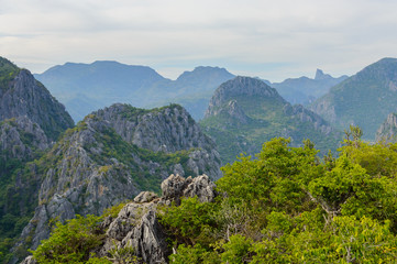 Fototapeta premium Mountain range landscape view of Khao Dang Viewpoint, Sam Roi Yod National park, Phra Chaup Khi Ri Khun Province in Middle of Thailand.