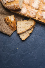 Whole wheat bread baked at home, bio ingredients, very healthy with seeds. top view. copy space.
