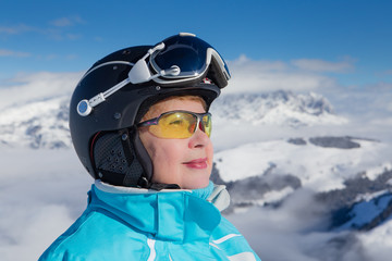 Portrait skier mountains in the background. Ski resort  Soll, Tyrol, Austria