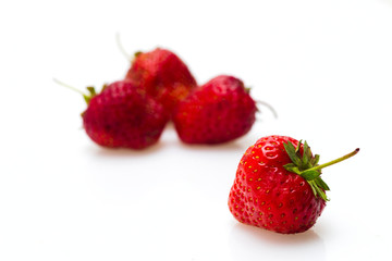 Berries of a strawberry on a white background