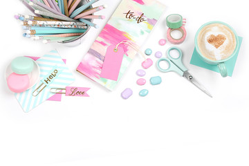 Styled desktop wih pencils, notecards and scissors