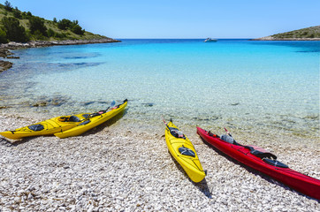 Canoe Boats on a bay of  Kornati islands, National park in Croatia, Adriatic sea:SIBENIK,CROATIA,May 28,2017