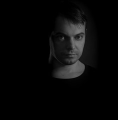 Black and white portrait of a young man.