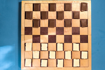 Two bars of chocolate on a chessboard