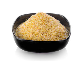 Wheat germ in a bowl on white background