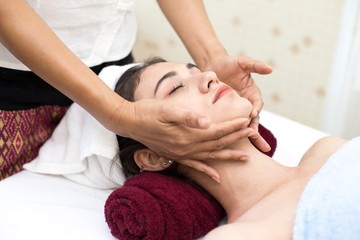 Fototapeta na wymiar Close up of Beautiful young woman having head massage in spa salon wellness, Beauty healthy lifestyle and relaxation concept