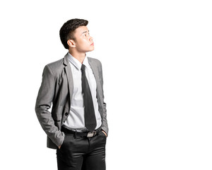 Obraz na płótnie Canvas Portrait of an asian business man thinking with suit. Isolated on white background with copy space and clipping path