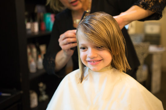 Girl Having Haircut