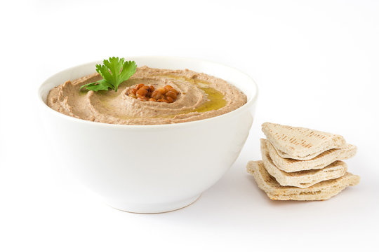 Lentil hummus and pita bread isolated on white background

