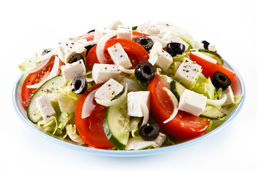 Greek salad on white background