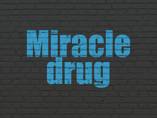 Fototapeta na wymiar Healthcare concept: Miracle Drug on wall background