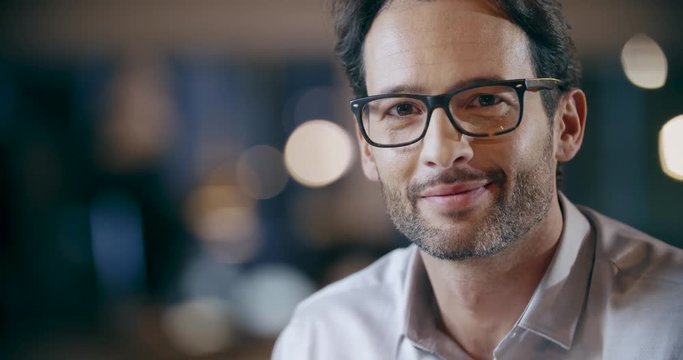 Confident man with eye glasses smiling portrait.Corporate business team work office meeting.Caucasian businessman and businesswoman people group talking together.Collaboration,growing,success.4k video